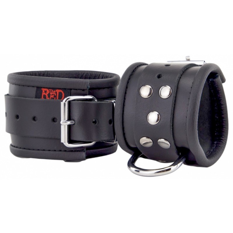Pair of BDSM handcuffs in black leather with gold buckles, 1969 selection