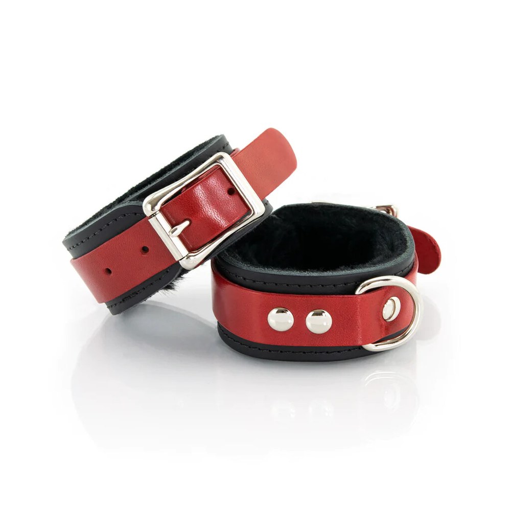 Pair of black and red BDSM handcuffs with fur, fetish model in the Pulsion-SM style